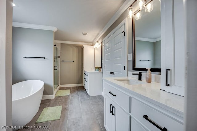 2803 Turtle Creek Dr, Lavaca, AR 72941 - full bath featuring two vanities, a stall shower, crown molding, a soaking tub, and baseboards
