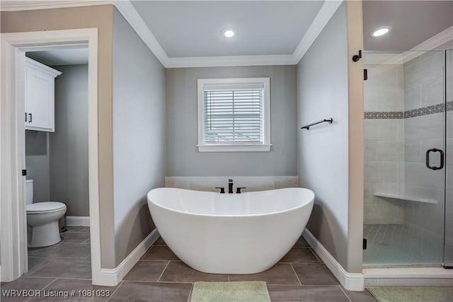 2803 Turtle Creek Dr, Lavaca, AR 72941 - full bathroom with a freestanding tub, baseboards, a stall shower, toilet, and crown molding