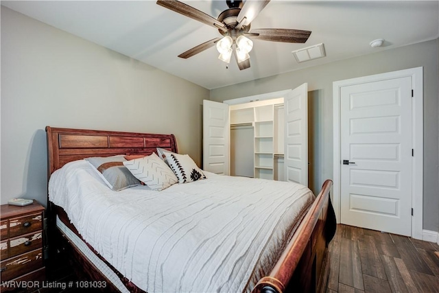 2803 Turtle Creek Dr, Lavaca, AR 72941 - bedroom with dark wood-style flooring, a ceiling fan, and baseboards