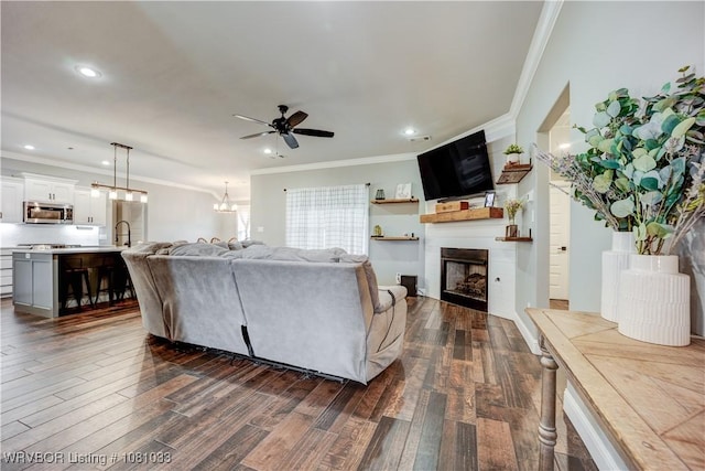 2803 Turtle Creek Dr, Lavaca, AR 72941 - living area featuring ornamental molding, ceiling fan, a large fireplace, dark wood-style floors, and recessed lighting