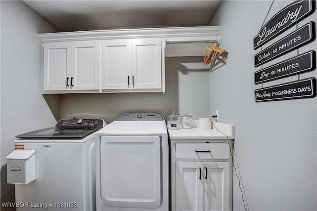 2803 Turtle Creek Dr, Lavaca, AR 72941 - laundry area with cabinet space and independent washer and dryer