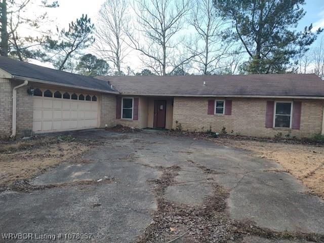 ranch-style house with a garage