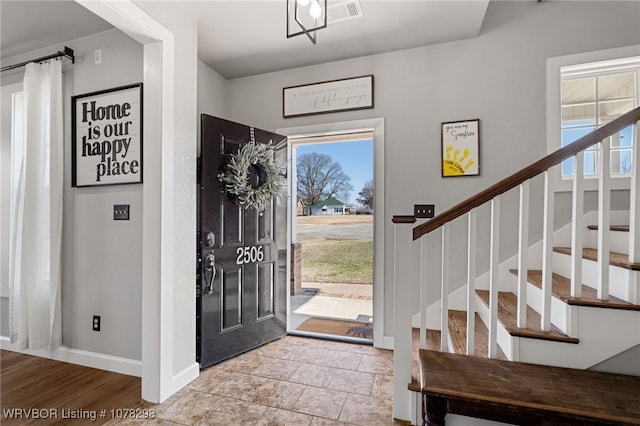 entrance foyer featuring a wealth of natural light