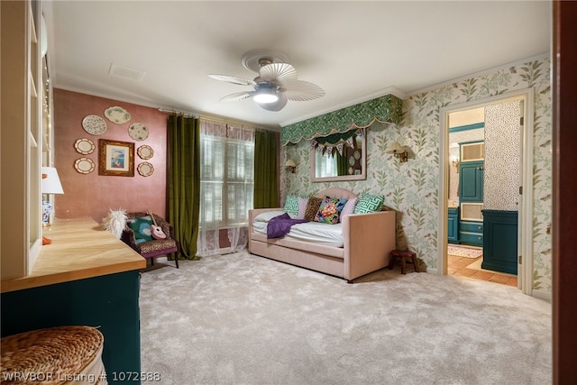 interior space featuring ceiling fan and crown molding