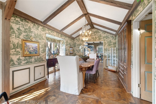 dining room featuring dark parquet floors, lofted ceiling with beams, and a notable chandelier