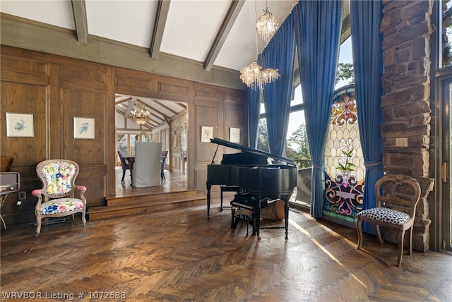 sitting room featuring dark parquet flooring, wooden walls, high vaulted ceiling, beamed ceiling, and a chandelier