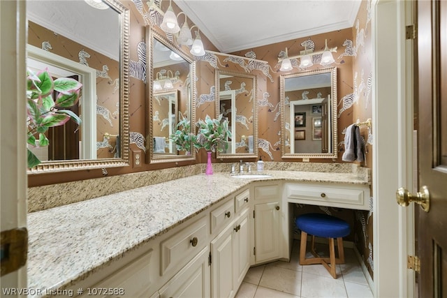 bathroom featuring vanity, tile patterned floors, and crown molding