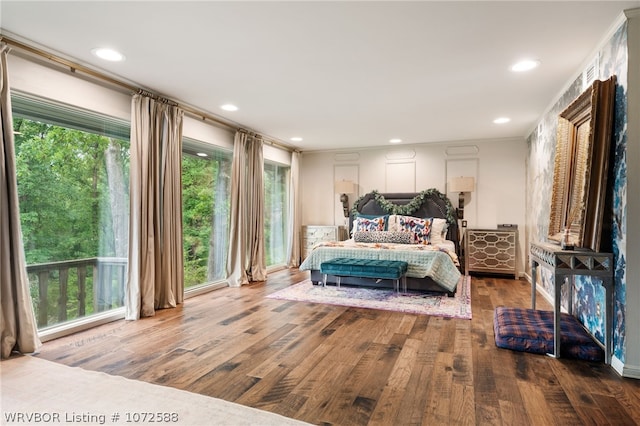 bedroom with wood-type flooring