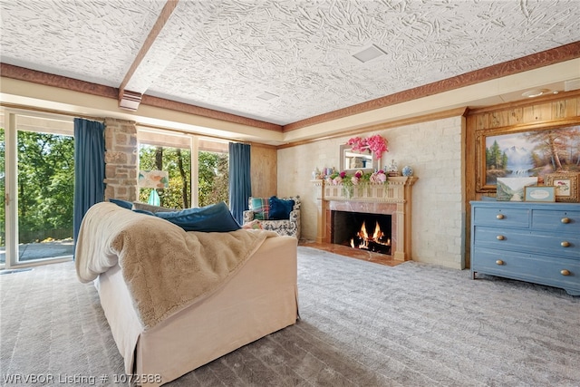 living room with beamed ceiling and carpet flooring