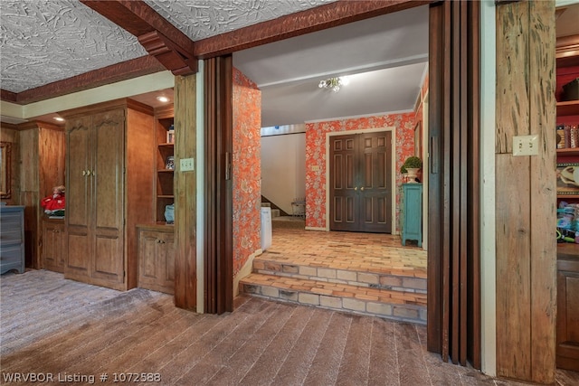 hallway featuring carpet floors