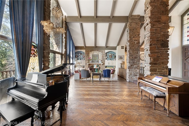 misc room with a wealth of natural light, decorative columns, high vaulted ceiling, and parquet floors