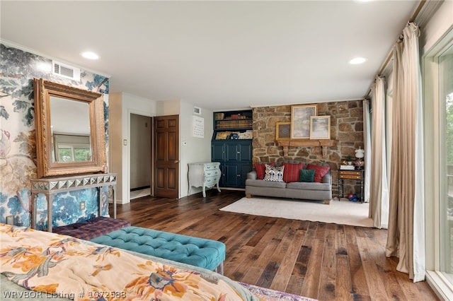 bedroom featuring dark hardwood / wood-style flooring