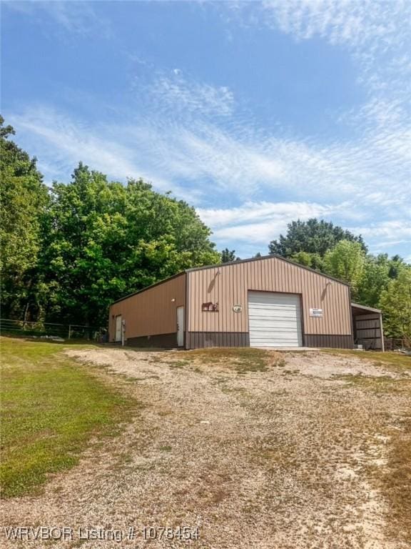 view of outbuilding with a garage