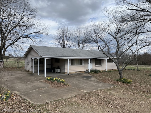 view of front of property with a carport