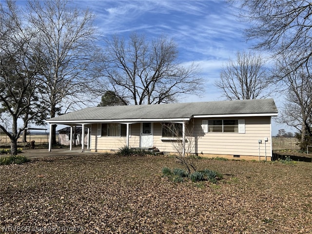 view of front of house with a carport