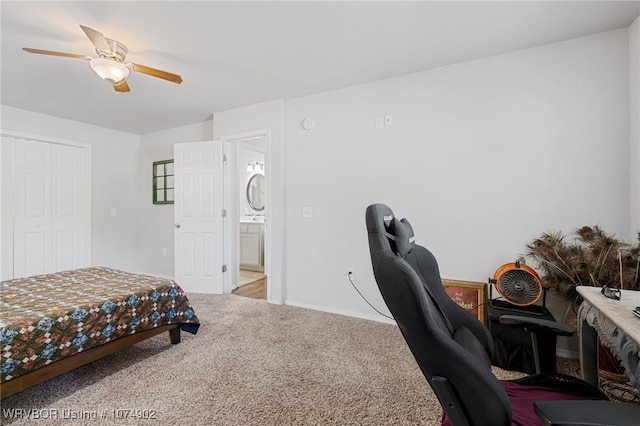 carpeted bedroom with ceiling fan and a closet