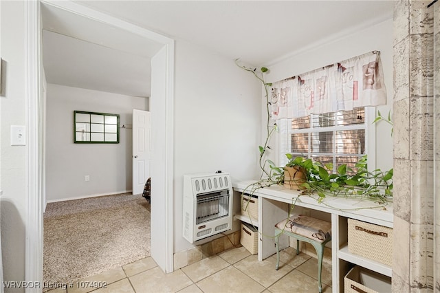 bathroom featuring tile patterned flooring and heating unit