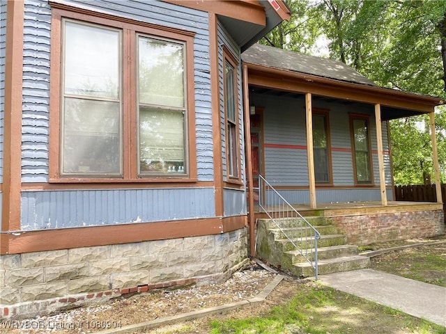 300 17th St, Fort Smith, AR 72901 - view of side of property featuring crawl space and covered porch