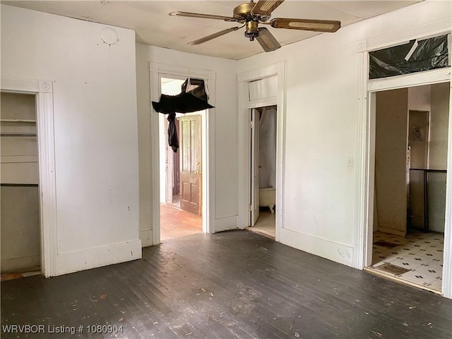300 17th St, Fort Smith, AR 72901 - unfurnished bedroom featuring wood finished floors, ensuite bath, and ceiling fan
