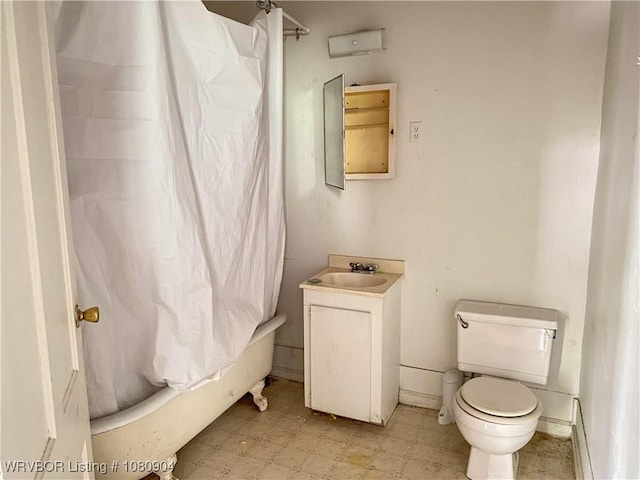 300 17th St, Fort Smith, AR 72901 - full bathroom featuring tile patterned floors, toilet, shower / tub combo with curtain, and vanity