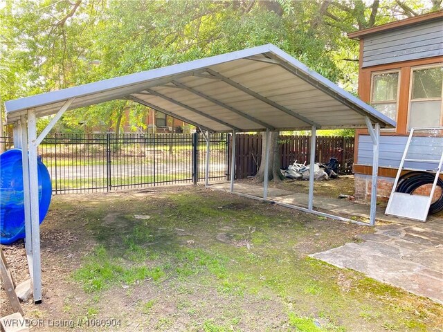 300 17th St, Fort Smith, AR 72901 - view of yard with a detached carport and fence