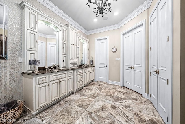 8200 Mile Tree Dr, Fort Smith, AR 72903 - bathroom featuring crown molding, a chandelier, marble finish floor, double vanity, and baseboards