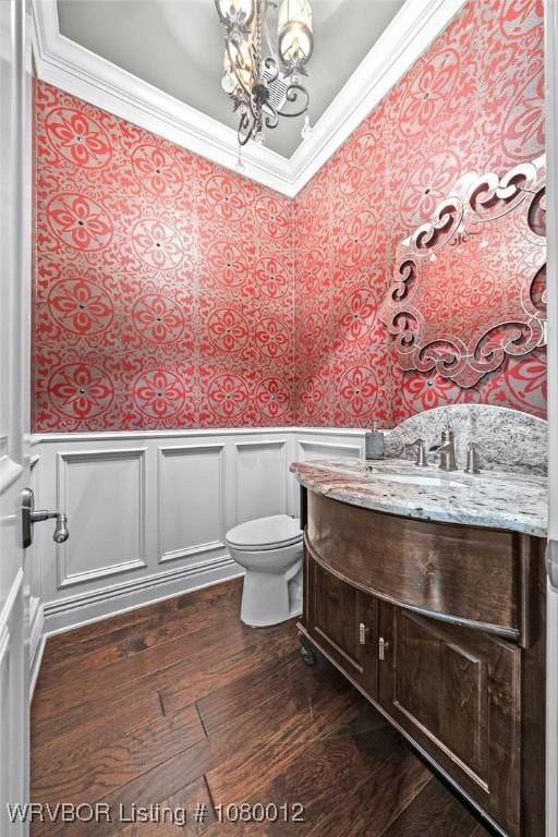 8200 Mile Tree Dr, Fort Smith, AR 72903 - bathroom featuring toilet, wainscoting, an inviting chandelier, and crown molding