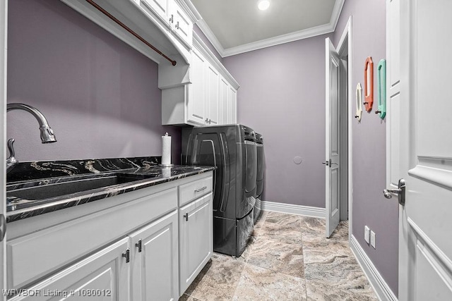 8200 Mile Tree Dr, Fort Smith, AR 72903 - laundry room featuring crown molding, a sink, baseboards, cabinet space, and washer and clothes dryer