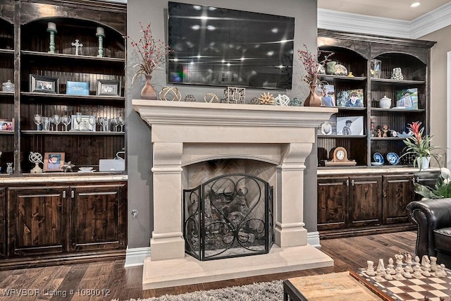 8200 Mile Tree Dr, Fort Smith, AR 72903 - living room featuring a fireplace with raised hearth, dark wood-style floors, and ornamental molding