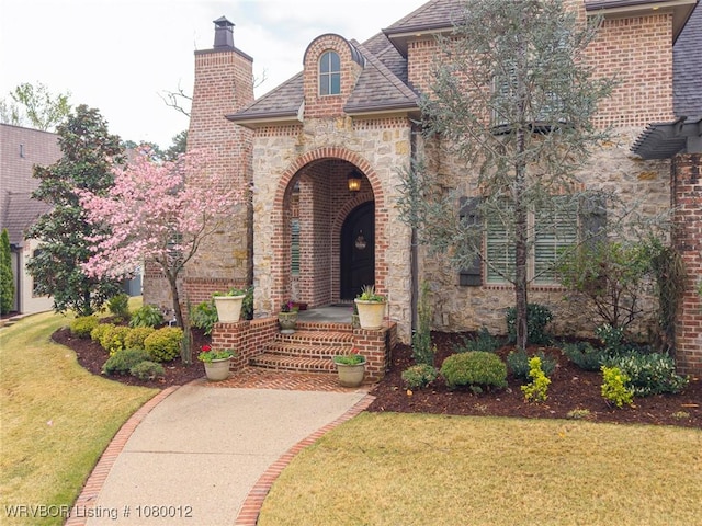 8200 Mile Tree Dr, Fort Smith, AR 72903 - entrance to property with a yard, brick siding, stone siding, and a chimney