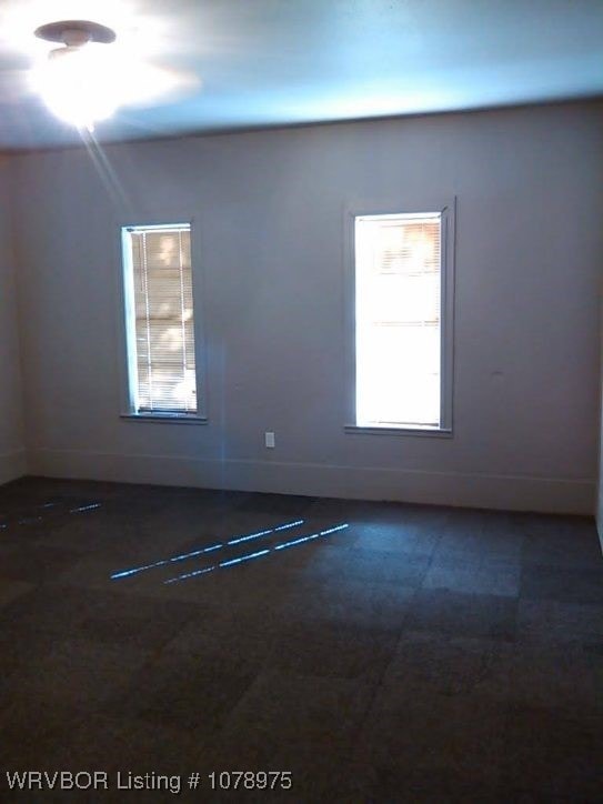 436 N Pine St, Waldron, AR 72958 - unfurnished room with baseboards