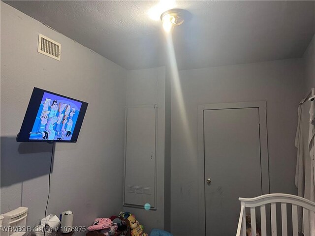 436 N Pine St, Waldron, AR 72958 - bedroom with a crib and visible vents