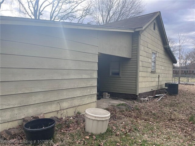 436 N Pine St, Waldron, AR 72958 - view of side of property featuring cooling unit and crawl space