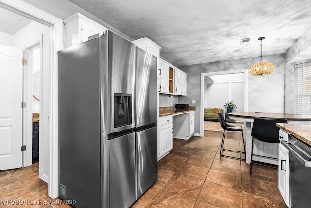 kitchen with white cabinetry, hanging light fixtures, light stone counters, stainless steel refrigerator with ice dispenser, and a breakfast bar area