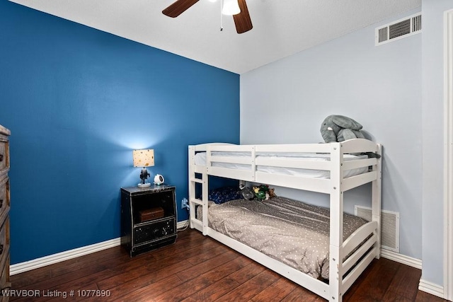 bedroom featuring ceiling fan and hardwood / wood-style flooring