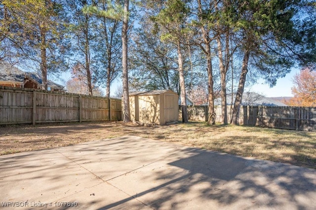 view of patio / terrace with a mountain view and a storage unit