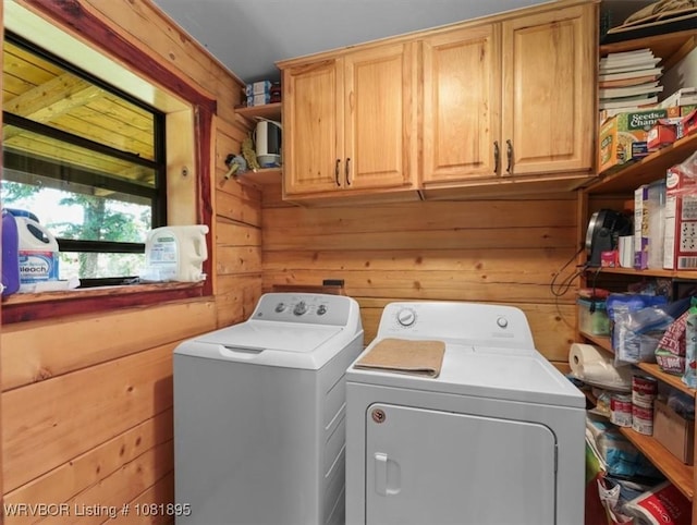 161129 N 4550th Rd, Talihina, OK 74571 - laundry room with washer and clothes dryer, wooden walls, and cabinet space