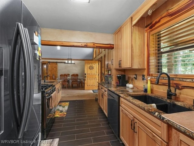 161129 N 4550th Rd, Talihina, OK 74571 - kitchen featuring black appliances, dark stone countertops, hanging light fixtures, and light brown cabinets
