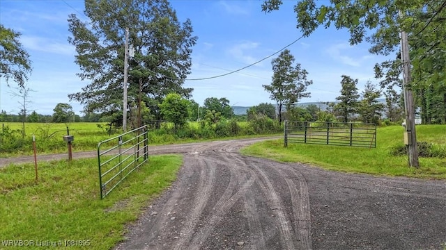 161129 N 4550th Rd, Talihina, OK 74571 - view of dirt / gravel road featuring a view of countryside