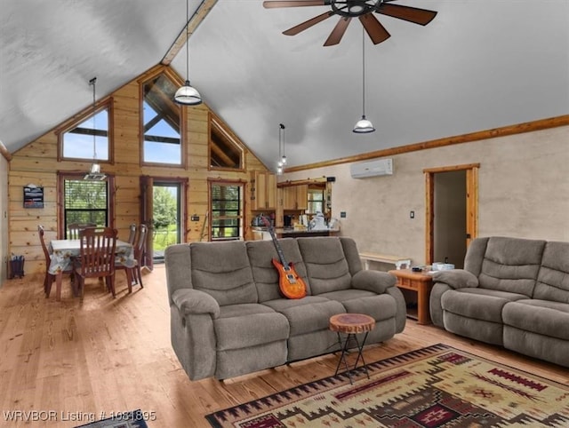 161129 N 4550th Rd, Talihina, OK 74571 - living area featuring a wall mounted air conditioner, light wood finished floors, a ceiling fan, wood walls, and high vaulted ceiling