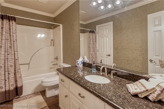 bathroom featuring ornamental molding, shower / tub combo with curtain, vanity, and toilet