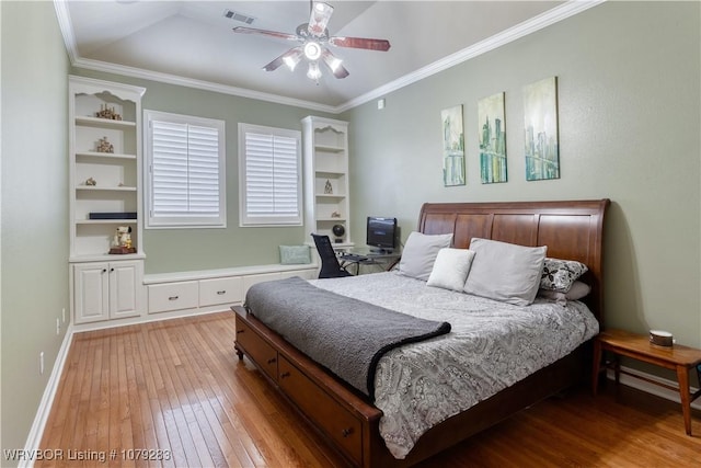 bedroom with baseboards, visible vents, a ceiling fan, crown molding, and light wood-style floors