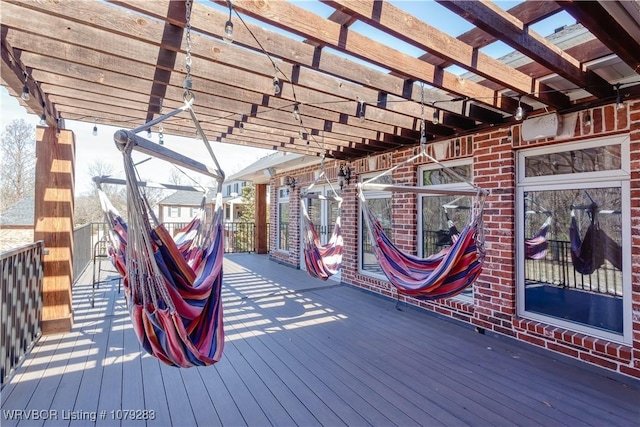 wooden terrace featuring a pergola