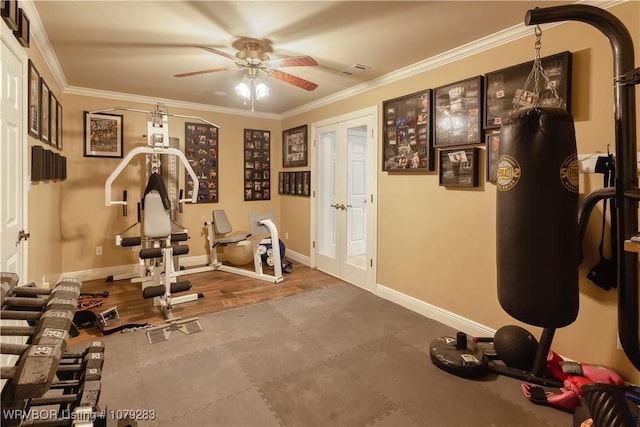 exercise room featuring french doors, crown molding, visible vents, ceiling fan, and baseboards