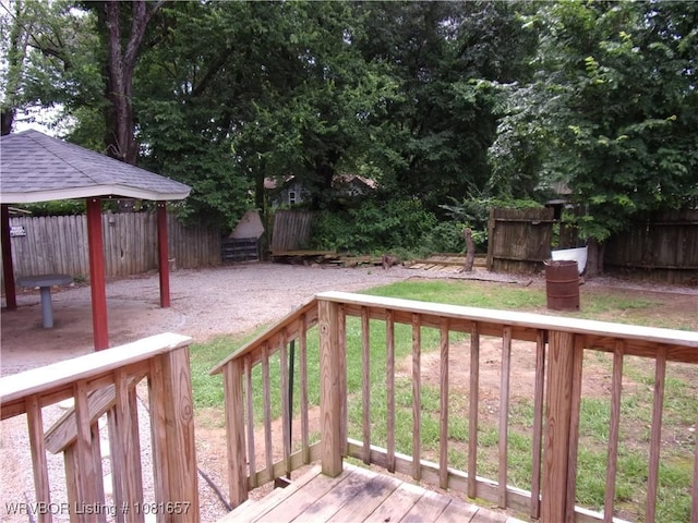 818 N 3rd St, Ozark, AR 72949 - wooden terrace featuring a gazebo, a fenced backyard, and a patio