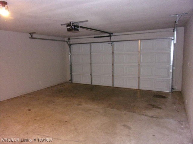 818 N 3rd St, Ozark, AR 72949 - garage with a garage door opener