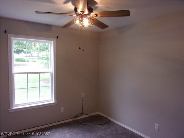 818 N 3rd St, Ozark, AR 72949 - carpeted empty room with a ceiling fan and baseboards