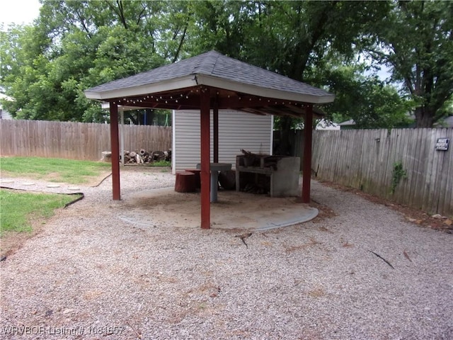 818 N 3rd St, Ozark, AR 72949 - fenced backyard featuring a gazebo and a patio