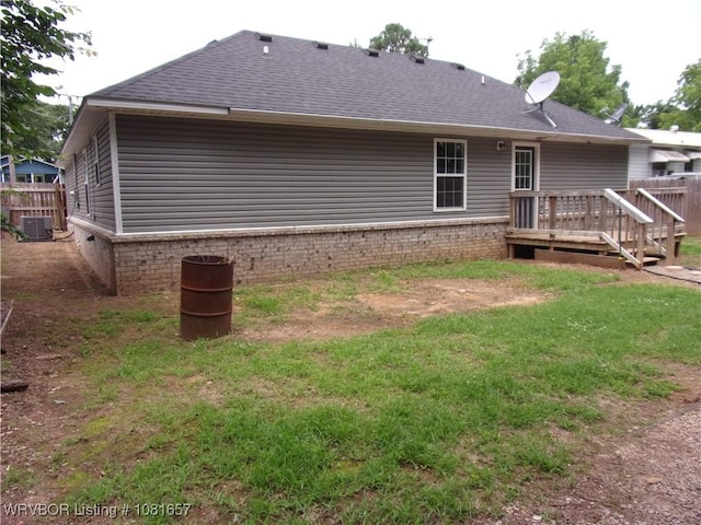 818 N 3rd St, Ozark, AR 72949 - rear view of house with a wooden deck and roof with shingles