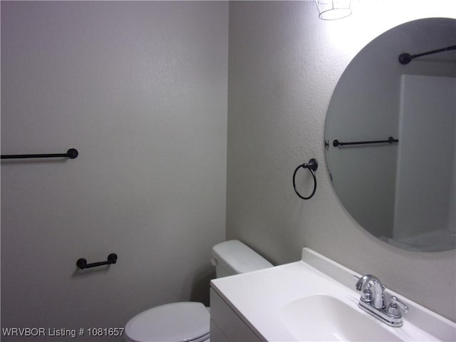 818 N 3rd St, Ozark, AR 72949 - bathroom featuring toilet and vanity